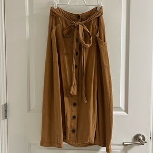 Camel colored button skirt from Maeve